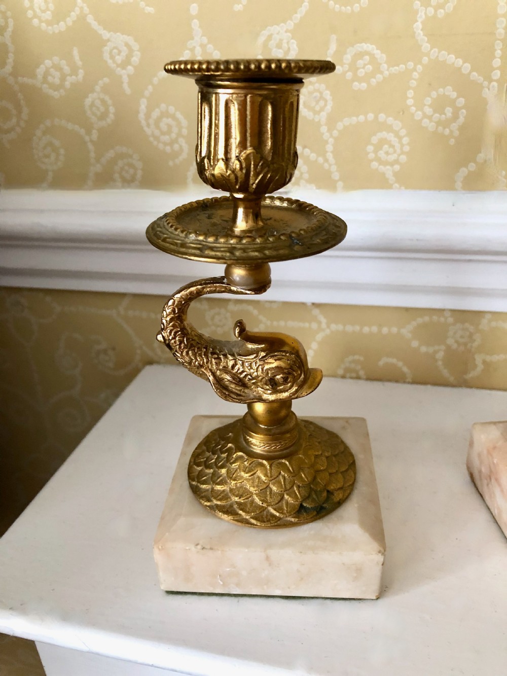 Pair of Early 19th century gilt bronze dolphin candlesticks View II