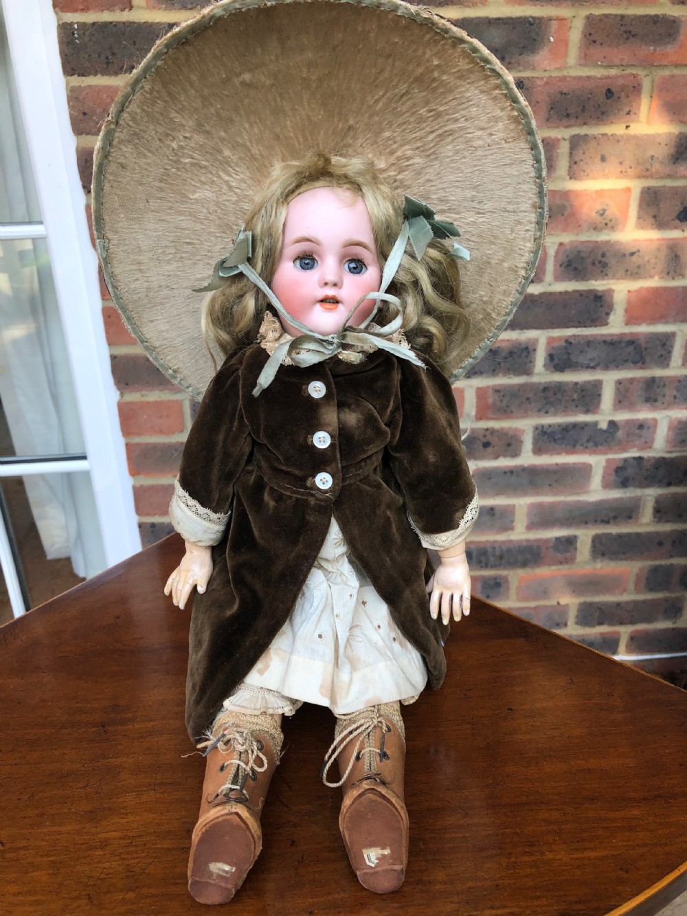 A Charming German Bisque headed Doll in Original Clothes c.1910