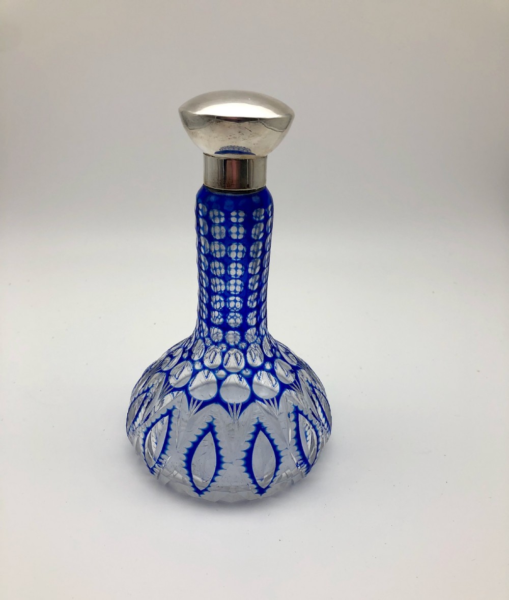 A Decorative Blue and Clear Glass Scent Bottle with a Silver Plate Lid c.1870