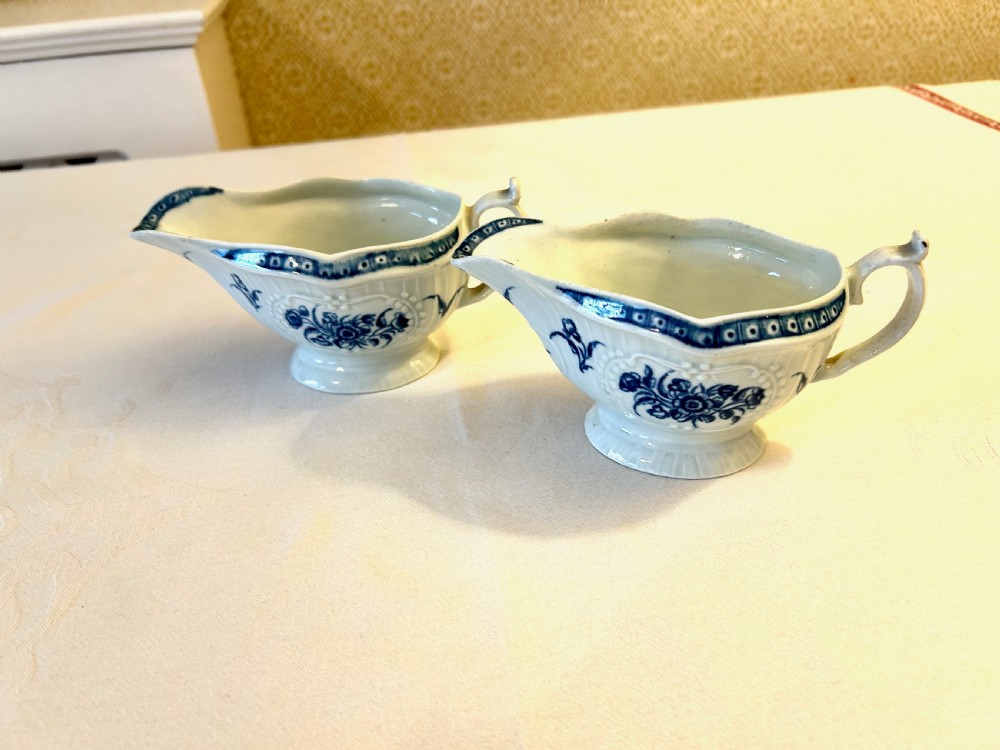 A Pair of 1st Period Blue and White Worcester Sauce Boats - Strap Flute Floral