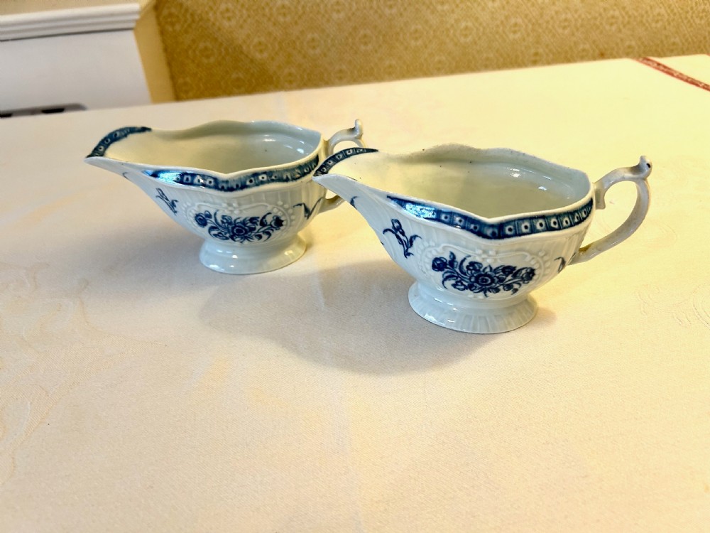 A Pair of 1st Period Blue and White Worcester Sauce Boats - Strap Flute Floral View IV