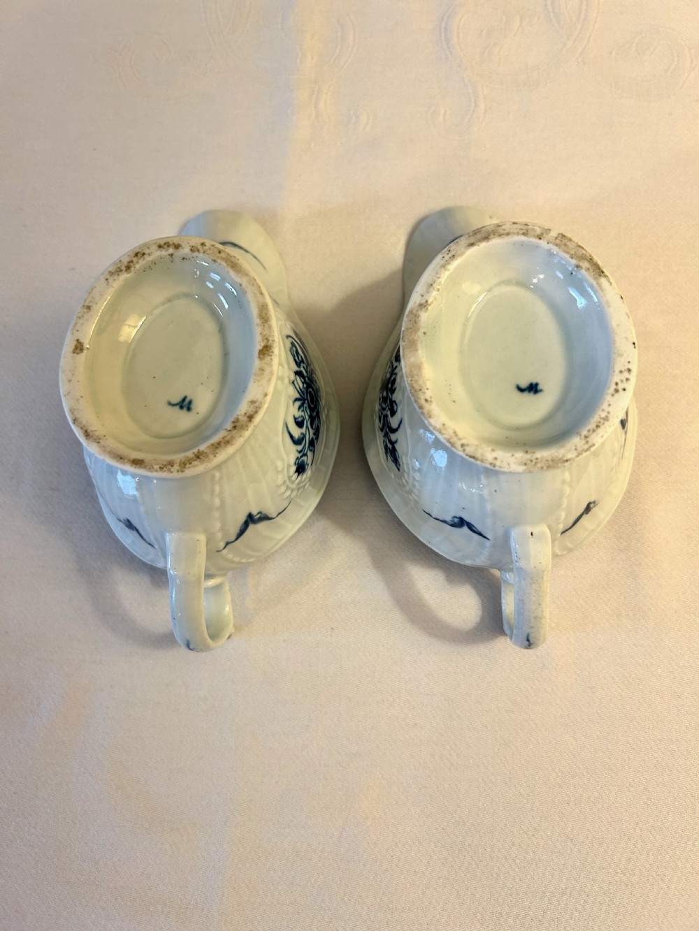 A Pair of 1st Period Blue and White Worcester Sauce Boats - Strap Flute Floral View VI