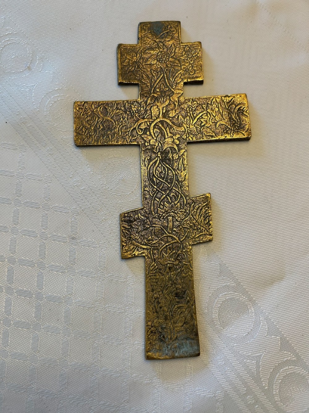 A 19th-century cast bronze Russian Orthodox eight-pointed cross featuring inlaid blue and white enamel detailing and Cyrillic inscriptions. View III