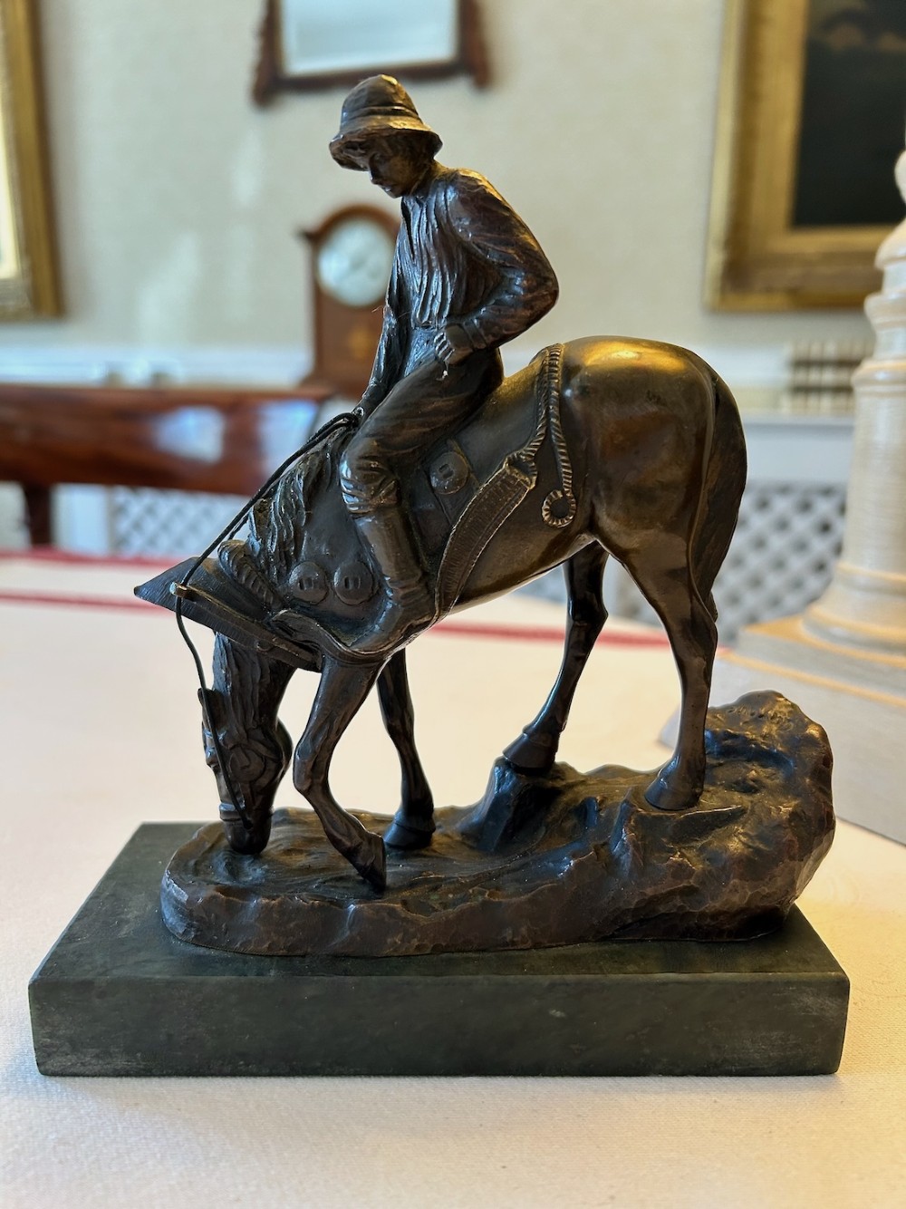 A Charming Bronze Figure of a Young Boy on a Horse c.1920