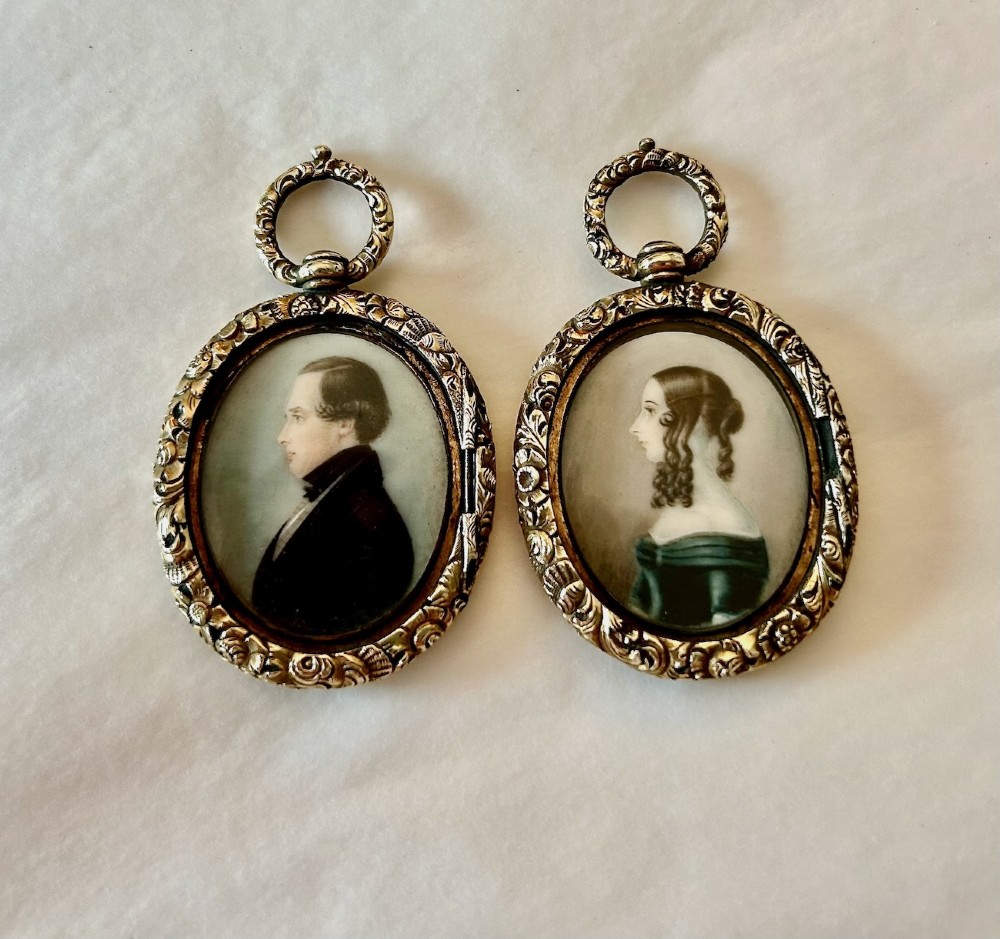A Pair of Late 18th Century Portrait Miniatures of a Husband and Wife in Gilt Oval Frames View IV