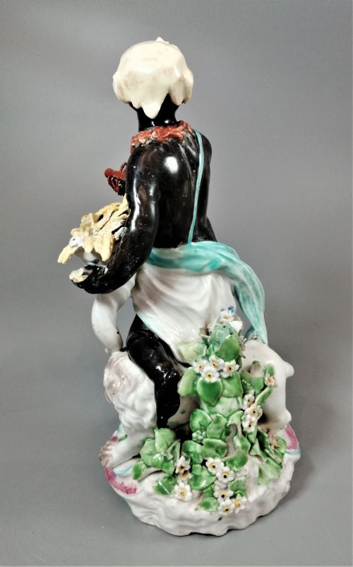 AN 18TH CENTURY PORCELAIN FIGURINE FROM DERBY SYMBOLISING AFRICA FROM A SET OF FOUR CONTINENTS - ADDITIONAL PHOTO 3