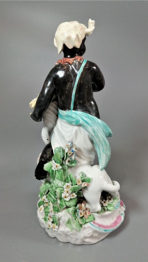 AN 18TH CENTURY PORCELAIN FIGURINE FROM DERBY SYMBOLISING AFRICA FROM A SET OF FOUR CONTINENTS - ADDITIONAL PHOTO 4
