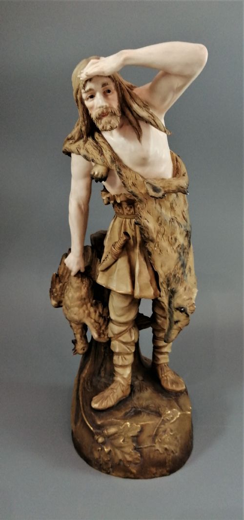 fig 1. Ernst Wahliss Vienna Porcelain Sculpture “Hunter in Wolfskin”