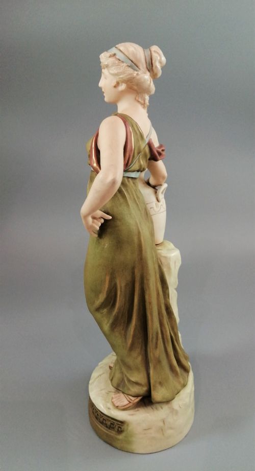 fig 2. Beautiful antique Royal Dux porcelain figurine depicting a lady holding a jug.