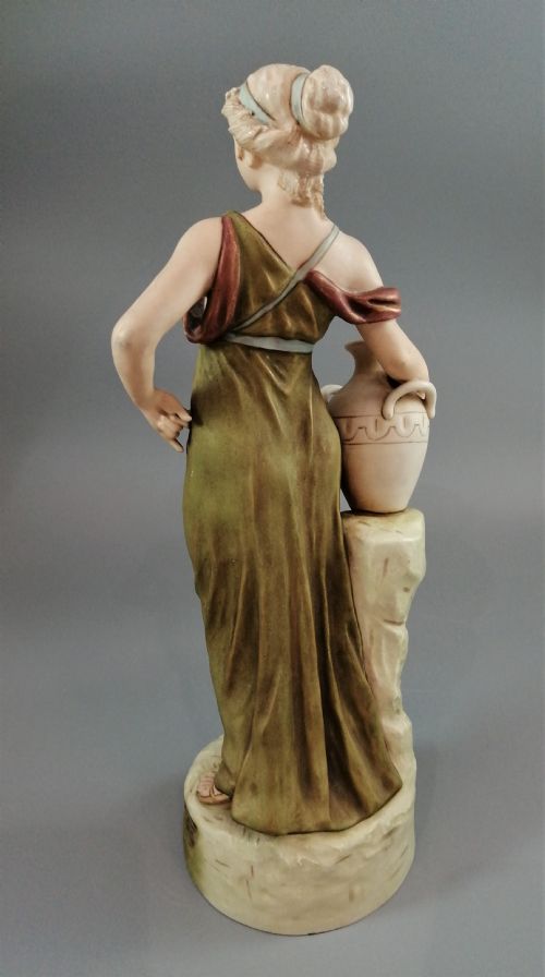 fig 5. Beautiful antique Royal Dux porcelain figurine depicting a lady holding a jug.