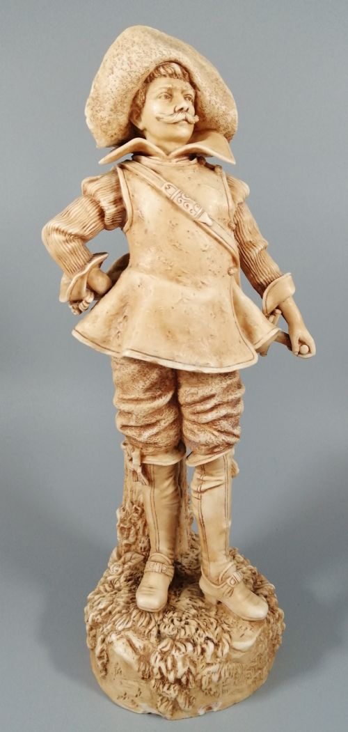 A Robinson and Leadbeater Ivory Parian Ware Figure of a Musketeer