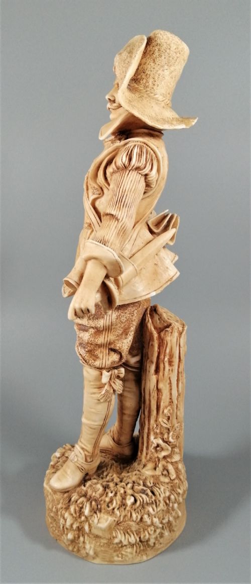 fig 1. A Robinson and Leadbeater ivory parian ware figure of a musketeer