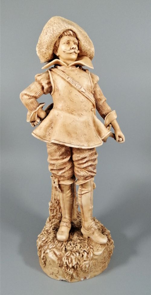 fig 2. A Robinson and Leadbeater ivory parian ware figure of a musketeer