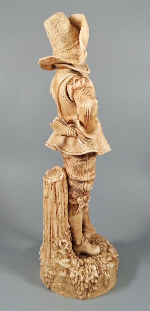 fig 4. A Robinson and Leadbeater ivory parian ware figure of a musketeer