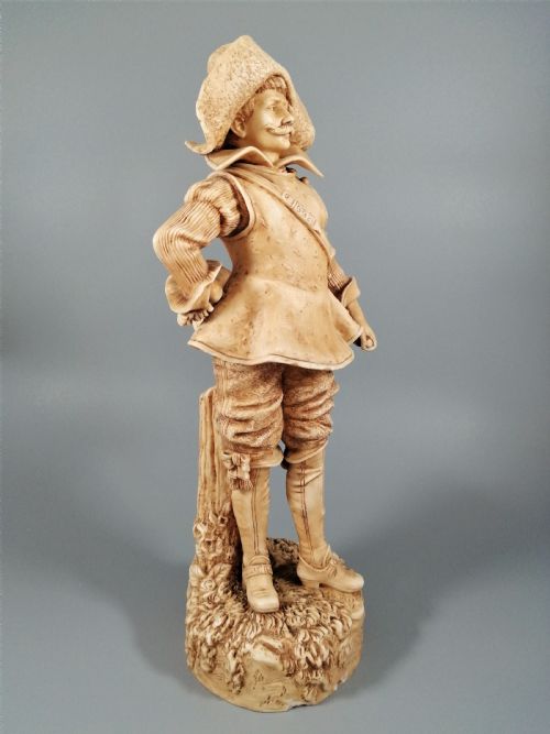 fig 6. A Robinson and Leadbeater ivory parian ware figure of a musketeer