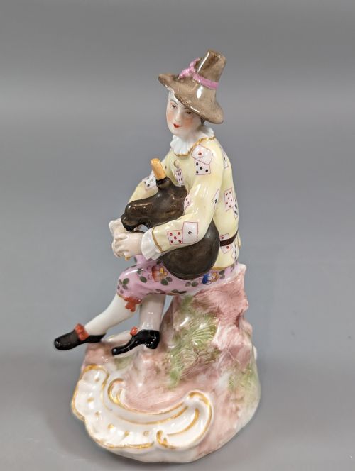 fig 1. Porcelaine de Paris, Marx Eugene Clauss, Harlequin playing the bagpipe