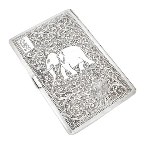 fig 2. 19th century Anglo-Indian Kutch silver cigarette case with lion, elephant, bird and scrolls