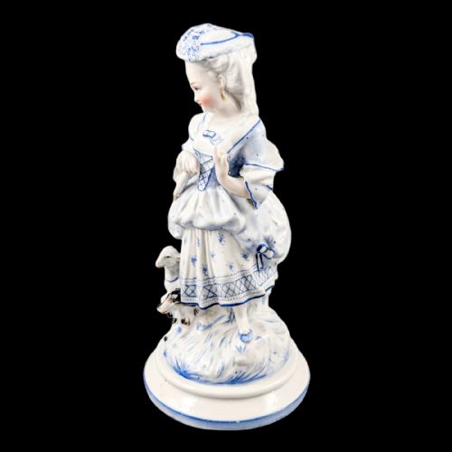 fig 1. 19th century German glazed porcelain figurine of a shepherdess by Conta & Boehme