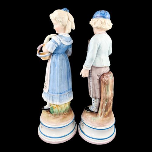 fig 2. Pair of large antique 19th century French bisque porcelain figurines