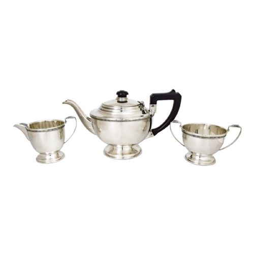 Antique Three Piece Art Deco Sterling Silver Tea Set with Bow Garlands and Geometric Handles