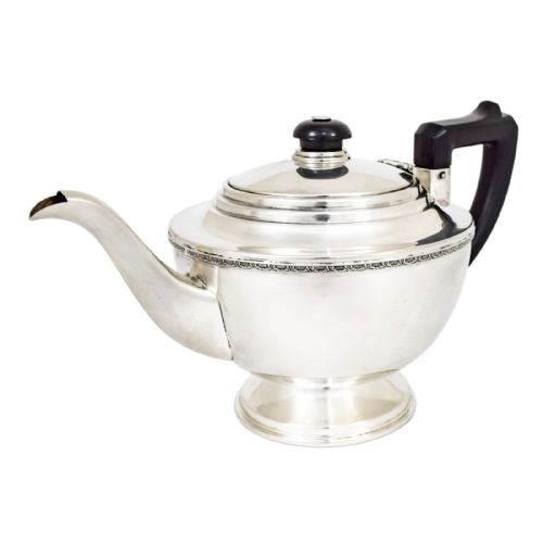 fig 1. Antique three piece Art Deco sterling silver tea set with bow garlands and geometric handles