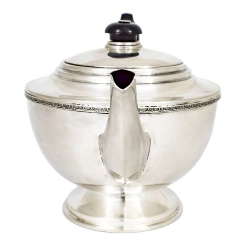 fig 2. Antique three piece Art Deco sterling silver tea set with bow garlands and geometric handles