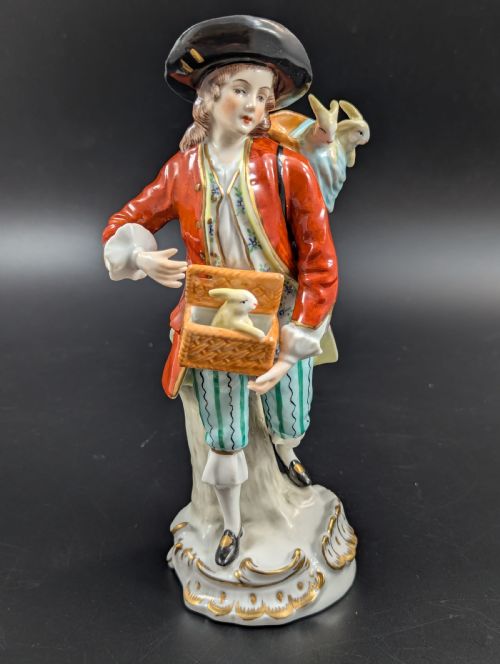 Lovely Early 20th Century Sitzendorf Porcelain Figurine of a Young Rabbit Seller.