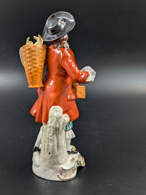 fig 3. Lovely early 20th century Sitzendorf porcelain figurine of a young rabbit seller.