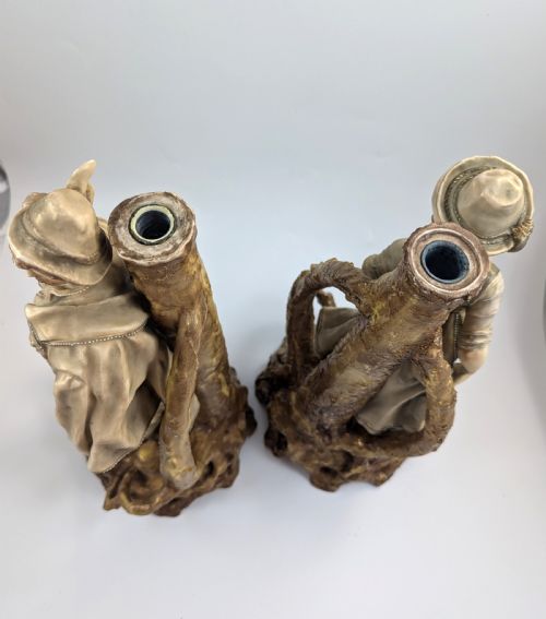 fig 5. A pair of nineteenth-century Bohemian porcelain figurines depicting a man and woman in folk attire framed by gilded root-like arbours on sculpted bases.