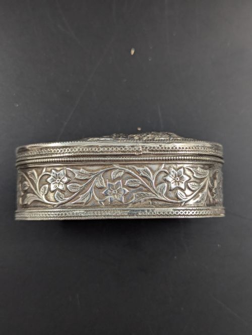 fig 2. Antique Silver Snuff Box Depicting a Battle Between a Lion and a Mythological Beast
