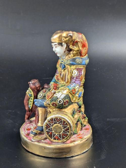 fig 1. Antique Porcelain Figurine ‘Boy with Monkeys’ by Satsuma, Japan, Meiji period (1868 -1912).