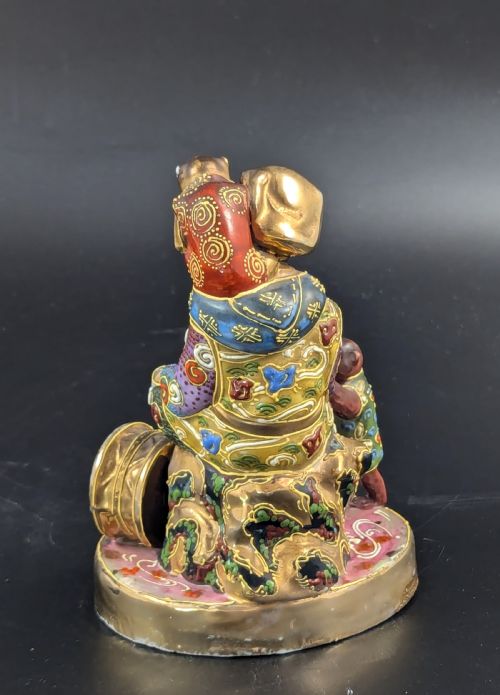 fig 3. Antique Porcelain Figurine ‘Boy with Monkeys’ by Satsuma, Japan, Meiji period (1868 -1912).