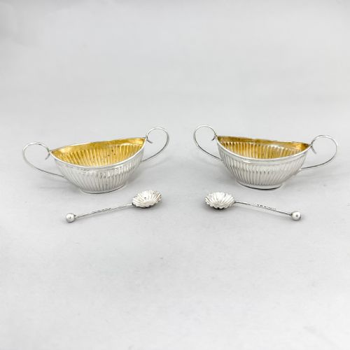 fig 4. Pair of antique gilt sterling silver boxed navette salts with shell spoons, 1900