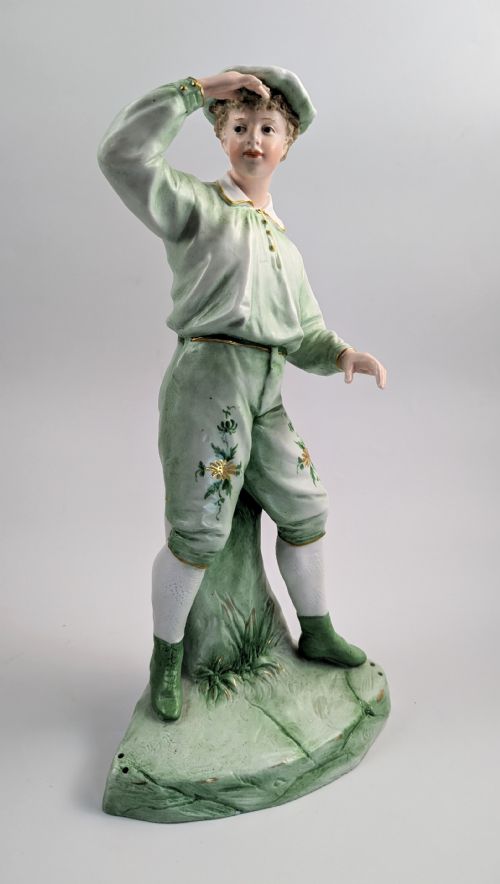 fig 1. Gebrüder Heubach biscuit porcelain figurine of a young boy, c. 1885