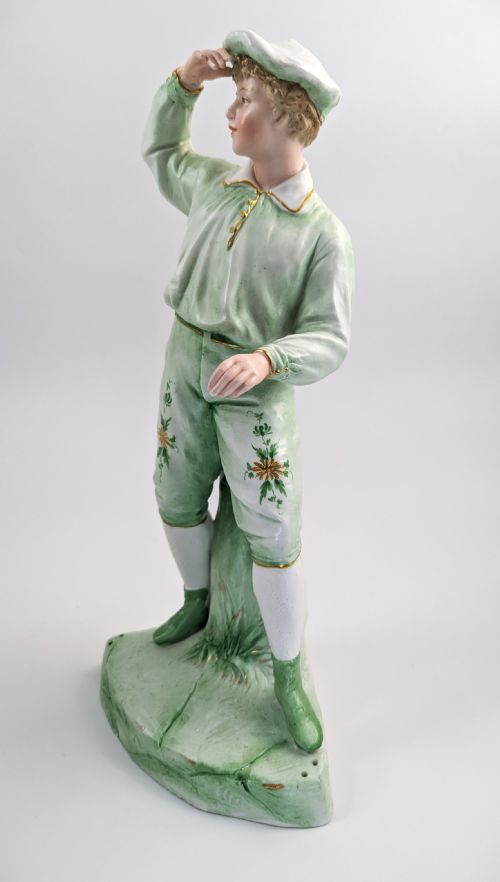 fig 2. Gebrüder Heubach biscuit porcelain figurine of a young boy, c. 1885