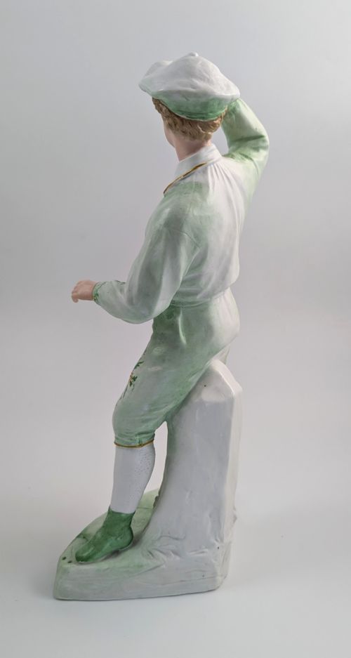 fig 3. Gebrüder Heubach biscuit porcelain figurine of a young boy, c. 1885
