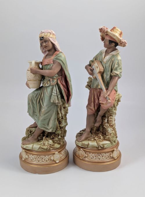 fig 1. Antique Royal Dux Bohemia Porcelain Figures of Gypsy Boy and Girl, c. 1875