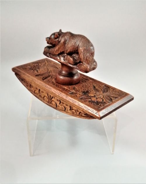 fig 1. 19th century Black Forest walnut desk blotter with a bear