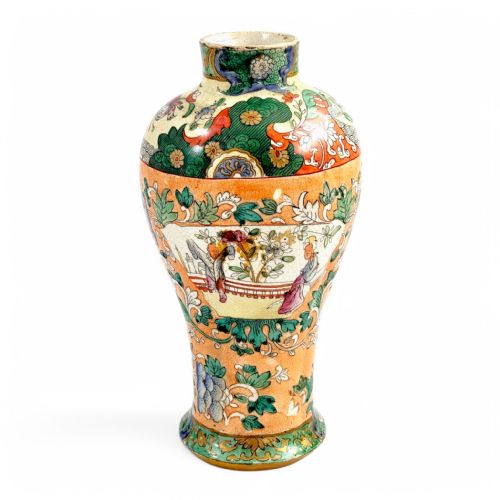 fig 5. A Regency period baluster-shaped Miles Mason ironstone vase featuring an orange background with intricate hand-painted Chinoiserie floral patterns and polychrome enamel detailing.