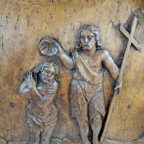 fig 4. A square French Louis XIII carved walnut panel featuring a relief sculpture of the Baptism of Christ framed by architectural scrollwork.