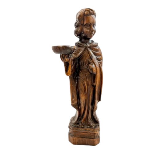 fig 2. An 18th-century Continental carved wooden figure of an acolyte in draped robes holding a small dish, mounted on a square plinth.