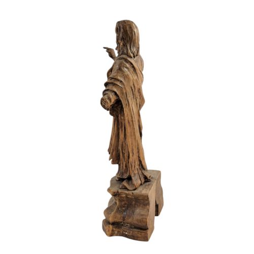 fig 1. A South German Baroque carved lindenwood figure depicting Christ in draped robes standing on a moulded pedestal.
