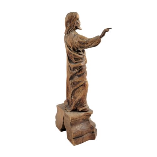 fig 2. A South German Baroque carved lindenwood figure depicting Christ in draped robes standing on a moulded pedestal.