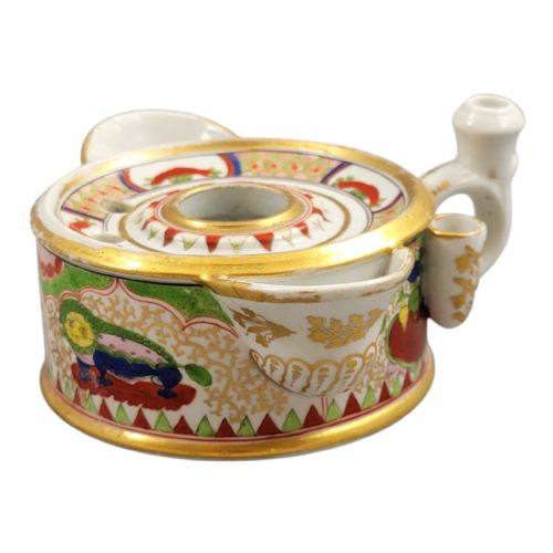fig 2. A circular Flight Barr and Barr Worcester porcelain inkwell decorated with the hand-painted Dragon in Compartments pattern, gold leaf borders, and built-in pen holders.