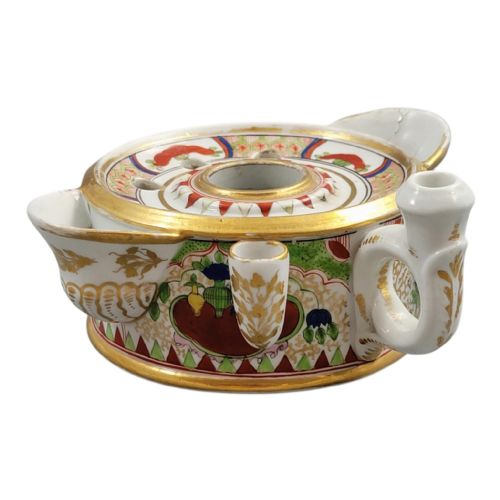 fig 3. A circular Flight Barr and Barr Worcester porcelain inkwell decorated with the hand-painted Dragon in Compartments pattern, gold leaf borders, and built-in pen holders.