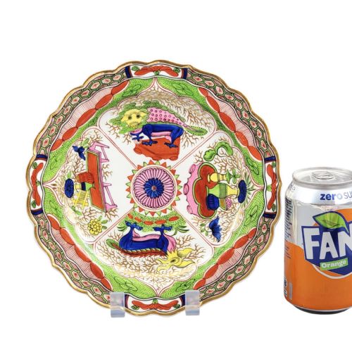 fig 2. A circular Regency porcelain plate with a scalloped gilded rim and hand-painted dragon in compartments pattern in red, green, and blue enamels.