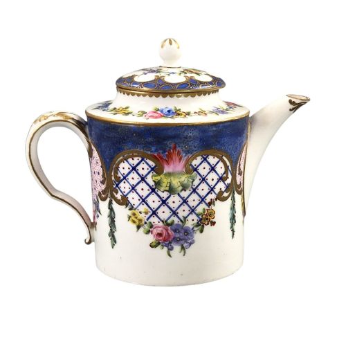 fig 2. An 18th-century French Sevres soft-paste porcelain litron teapot decorated with hand-painted floral cartouches, gilding, and cobalt blue borders.