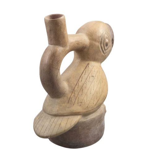fig 2. A beige terracotta Pre-Columbian stirrup spout vessel sculpted in the shape of a perched bird.