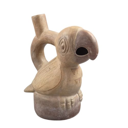 fig 4. A beige terracotta Pre-Columbian stirrup spout vessel sculpted in the shape of a perched bird.