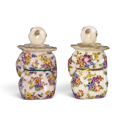 fig 2. A pair of antique French Samson porcelain figural inkwells depicting singing boys wearing floral robes and gilt-rimmed ruffs while holding open songbooks.